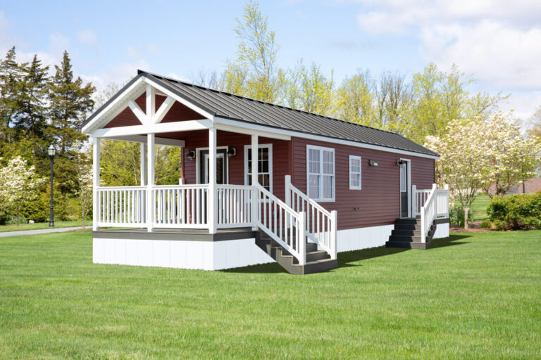 Santa Rosa cabin by dwellity with red siding and standing seam metal roof