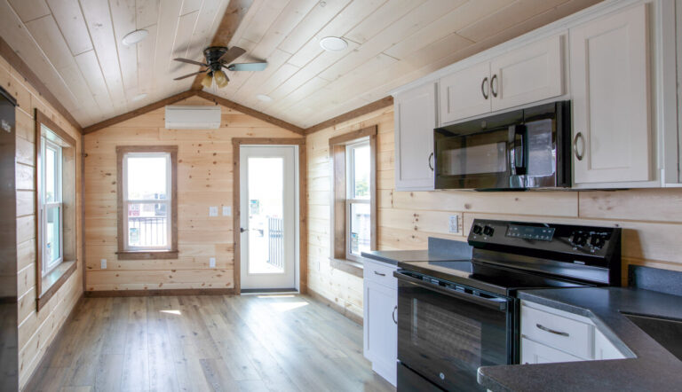White River cabin by dwellity Interior view of kitchen and dining area
