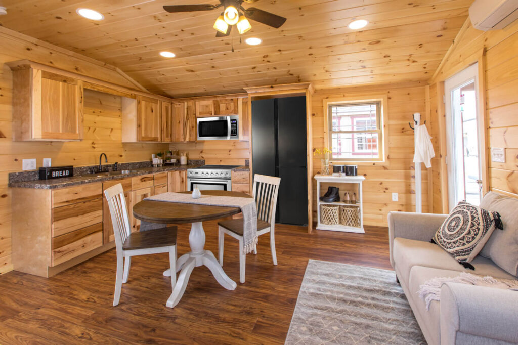 kitchen dining and seating area inside a cabin by dwellity