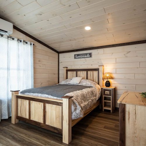 Kiononia bedroom with bed and dresser