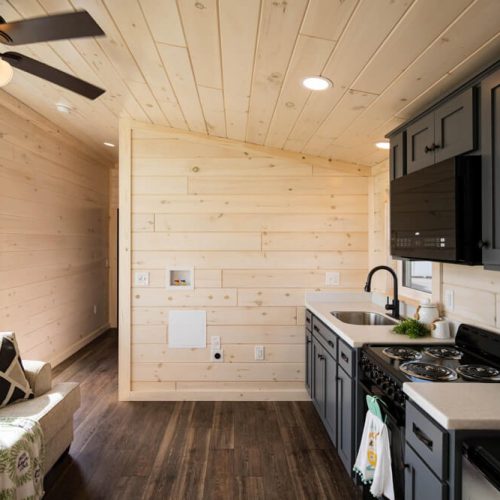 The Saragota Style 2 cabin interior kitchen and seating area