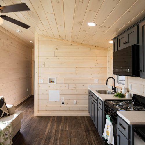 The Saragota Style 2 cabin interior kitchen and seating area