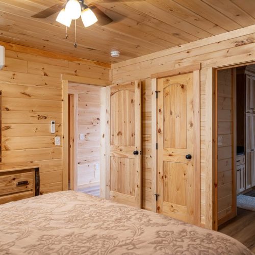 bedroom and closet in a cedar ridge cabin