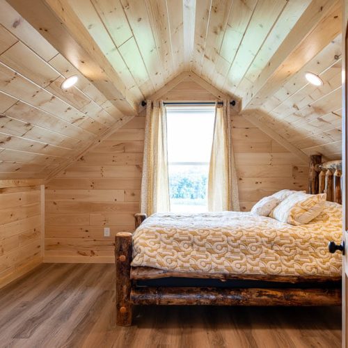 bedroom in the loft of a cedar ridge cabin 68055