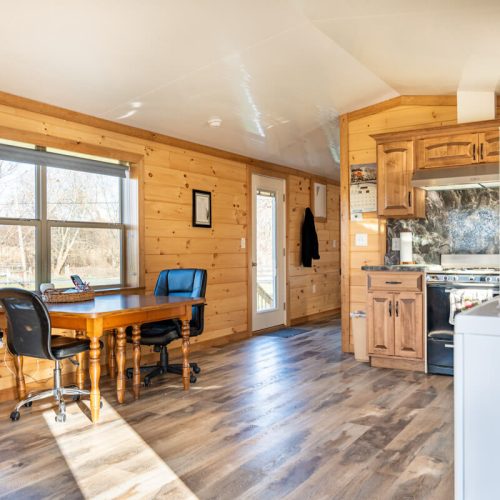 dining room inside a Redwood Lodge by Dwellity