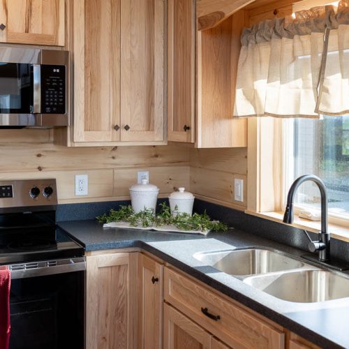 kitchen sink and stove in a cedar ridge lodge 68033