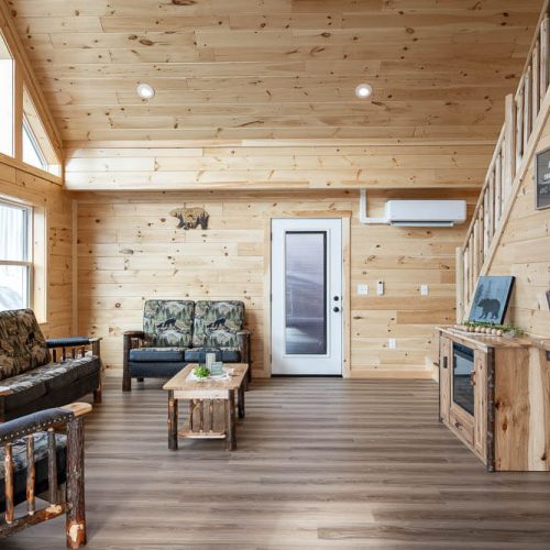living room with sofas in a cedar ridge lodge 68041